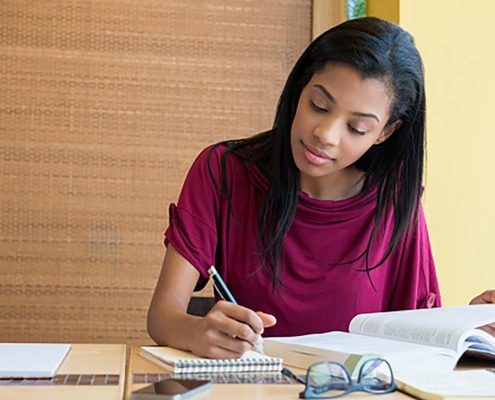 high school senior working on homework
