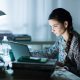student studying digital sat at night